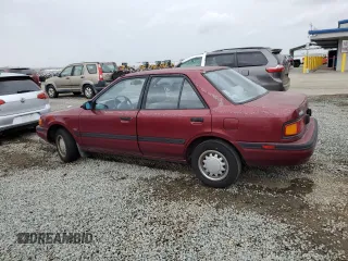 1990 Mazda Protege z VIN JM1BG2246L0167483, wystawiony jako Copart lot #48603295 z przebiegiem 170 461 mil mil oraz Czysty tytuł • Clean title. Historia ofert i sprzedaży dostępna na DreamBid. Obrazek 2.