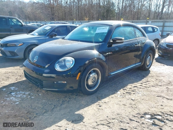 2012 Volkswagen Beetle 2.5L w/Sun/Sound/Nav PZEV with VIN 3VWHP7AT1CM652074, listed as a IAAI auction lot 41374829 with 1 mi miles. Bid and sale history available at carsss.com. Image 2.
