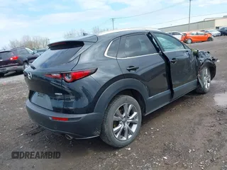 2022 Mazda CX-30 S Premium with VIN 3MVDMBDL5NM413878, listed as a IAAI auction lot 42189008 with 46,249 mi miles and . Bid and sale history available at DreamBid. Image 4.