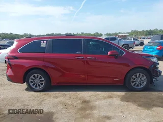 2021 Toyota Sienna XLE z VIN 5TDYRKEC2MS028134, wystawiony jako IAAI lot #42152640 z przebiegiem 107 427 mil mil oraz . Historia ofert i sprzedaży dostępna na DreamBid. Obrazek 13.