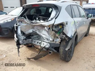 2016 Mazda CX-5 Grand Touring with VIN JM3KE4DY1G0616714, listed as a IAAI auction lot 41459781 with 90,763 mi miles. Bid and sale history available at carsss.com. Image 4.