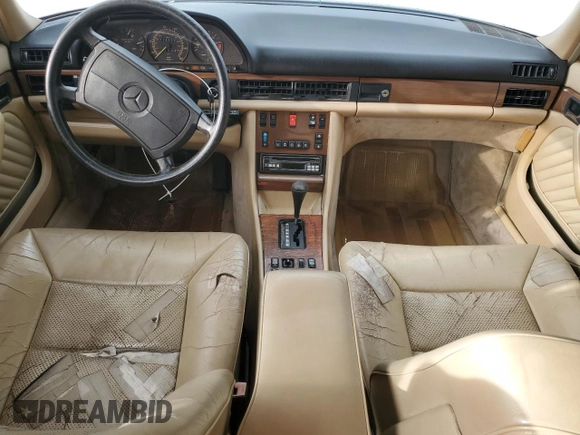 1989 Mercedes-Benz 300 with VIN WDBCA24D0KA457759, listed as a Copart auction lot 47920625 with 174,332 mi miles and Salvage Title. Bid and sale history available at DreamBid. Image 8.