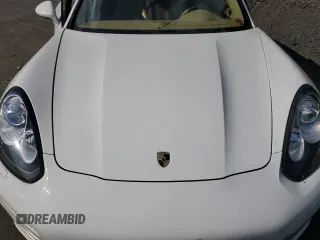 2014 Porsche Panamera с VIN WP0AA2A77EL008465, выставлен на аукционе Copart как лот 69671134 с пробегом Не указан миль и Чистый • Clean title. История ставок и продаж доступна на DreamBid. Изображение 12.