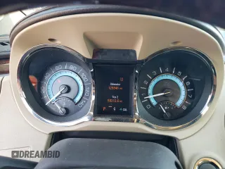 2013 Buick LaCrosse Premium 1 с VIN 1G4GG5E39DF189059, выставлен на аукционе Copart как лот 71013444 с пробегом 125 846 миль миль и Списание • Salvage title. История ставок и продаж доступна на DreamBid. Изображение 9.