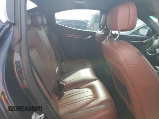2015 Maserati Ghibli with VIN ZAM57XSA6F1146076, listed as a Copart auction lot 52474303 with 82,575 mi miles. Bid and sale history available at carsss.com. Image 10.