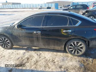 2018 Nissan Altima SV with VIN 1N4AL3APXJC176097, listed as a IAAI auction lot 41319860 with Not Provided miles and . Bid and sale history available at DreamBid. Image 13.