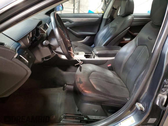 2013 Cadillac CTS Luxury with VIN 1G6DG5E57D0155572, listed as a Copart auction lot 50872505 with 82,875 mi miles and Salvage title. Bid and sale history available at DreamBid. Image 7.