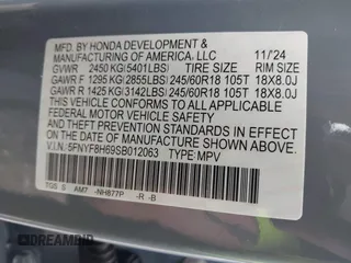 2025 Honda Passport TrailSport z VIN 5FNYF8H69SB012063, wystawiony jako IAAI lot #42060797 z przebiegiem 6078 mil mil oraz . Historia ofert i sprzedaży dostępna na DreamBid. Obrazek 9.