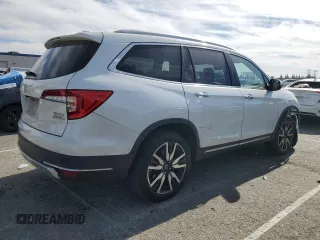 2021 Honda Pilot Elite with VIN 5FNYF6H02MB029791, listed as a Copart auction lot 42829435 with 54,403 mi miles and Salvage Title. Bid and sale history available at DreamBid. Image 3.
