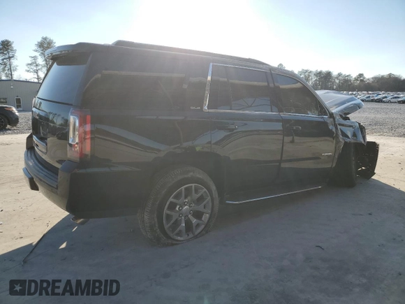 2019 GMC Yukon SLE with VIN 1GKS1AKC6KR302642, listed as a Copart auction lot 41510715 with 97,906 mi miles and Salvage Title. Bid and sale history available at carsss.com. Image 3.
