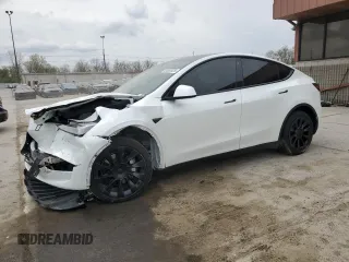 2023 Tesla Model Y Long Range z VIN 7SAYGAEE9PF686434, wystawiony jako Copart lot #54593475 z przebiegiem Nie podano mil oraz Szkoda całkowita • Salvage title. Historia ofert i sprzedaży dostępna na DreamBid. Obrazek 1.