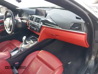 2016 BMW 4 Series 428i xDrive with VIN WBA4C9C56GG140427, listed as a IAAI auction lot 41886670 with 94,426 mi miles and . Bid and sale history available at carsss.com. Image 5.