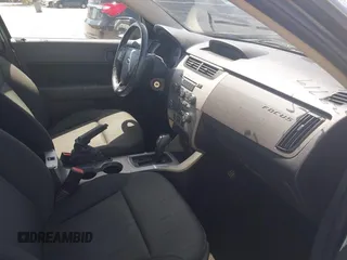 2009 Ford Focus SE with VIN 1FAHP35N99W147938, listed as a IAAI auction lot 41967707 with 48,254 mi miles and . Bid and sale history available at DreamBid. Image 5.