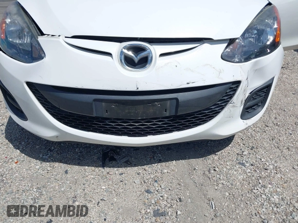 2014 Mazda 2 Sport with VIN JM1DE1KZ5E0171550, listed as a IAAI auction lot 41957824 with 70,838 mi miles and . Bid and sale history available at DreamBid. Image 6.