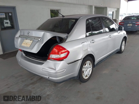2011 Nissan Versa S with VIN 3N1BC1APXBL460003, listed as a IAAI auction lot 42206242 with 113,099 mi miles and . Bid and sale history available at DreamBid. Image 4.