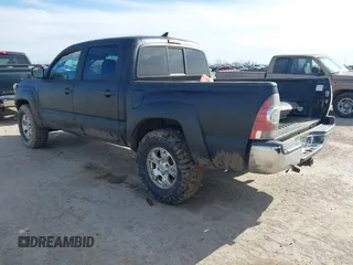 2015 Toyota Tacoma z VIN 3TMLU4ENXFM206669, wystawiony jako IAAI lot #41323365 z przebiegiem 102 297 mil mil oraz . Historia ofert i sprzedaży dostępna na DreamBid. Obrazek 3.