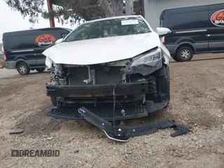 2019 Toyota Corolla L with VIN 5YFBURHE3KP895705, listed as a IAAI auction lot 42034995 with 173,719 mi miles and . Bid and sale history available at DreamBid. Image 13.