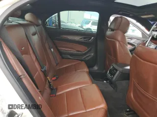 2014 Cadillac CTS Premium RWD z VIN 1G6AT5S30E0142990, wystawiony jako Copart lot #50801685 z przebiegiem 74 583 mil mil oraz Szkody całkowita. Historia ofert i sprzedaży dostępna na DreamBid. Obrazek 10.