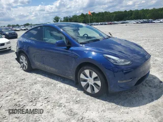 2022 Tesla Model Y Long Range z VIN 7SAYGDEE4NF426893, wystawiony jako Copart lot #55809275 z przebiegiem 16 083 mil mil oraz Szkoda całkowita • Salvage title. Historia ofert i sprzedaży dostępna na DreamBid. Obrazek 4.