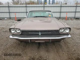 1966 Ford Thunderbird z VIN 6Y81Z127258, wystawiony jako Copart lot #52935585 z przebiegiem 59 083 mil mil oraz Czysty tytuł • Clean title. Historia ofert i sprzedaży dostępna na DreamBid. Obrazek 5.
