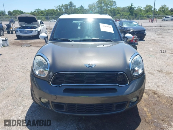 2012 MINI Countryman S z VIN WMWZC3C55CWL83472, wystawiony jako IAAI lot #42289981 z przebiegiem 101 812 mil mil oraz . Historia ofert i sprzedaży dostępna na DreamBid. Obrazek 12.