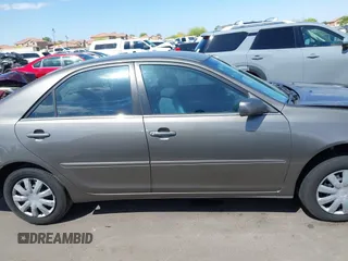2004 Toyota Camry LE with VIN 4T1BE32K44U825561, listed as a IAAI auction lot 42051914 with 244,521 mi miles and . Bid and sale history available at DreamBid. Image 12.