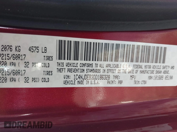 2013 Jeep Compass Latitude with VIN 1C4NJDEB3DD186328, listed as a IAAI auction lot 41357490 with 212,608 mi miles. Bid and sale history available at carsss.com. Image 9.