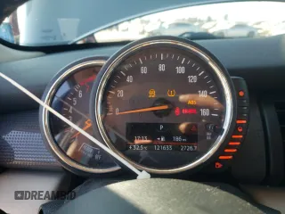 2016 MINI Hardtop 4 Door with VIN WMWXU1C59G2D11117, listed as a Copart auction lot 65191715 with 121,633 mi miles and Salvage title. Bid and sale history available at DreamBid. Image 9.