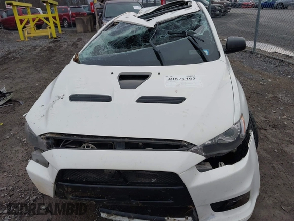 2014 Mitsubishi Lancer Evolution GSR with VIN JA32W8FV5EU012572, listed as a IAAI auction lot 40871463 with 89,529 mi miles. Bid and sale history available at carsss.com. Image 6.