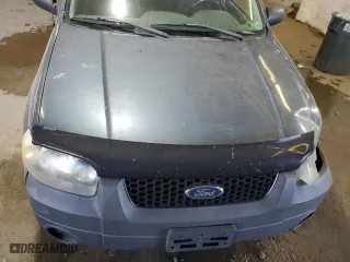 2006 Ford Escape XLS with VIN 1FMYU92Z56KA23659, listed as a Copart auction lot 76896374 with 0 mi miles and Salvage Title. Bid and sale history available at carsss.com. Image 12.