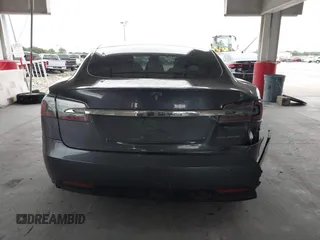 2021 Tesla Model S Long Range Plus with VIN 5YJSA1E28MF421655, listed as a IAAI auction lot 42407234 with 111,443 mi miles and . Bid and sale history available at DreamBid. Image 16.