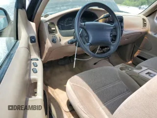 2000 Ford Explorer Sport with VIN 1FMYU60E8YUB03494, listed as a Copart auction lot 59266395 with 210,925 mi miles and Salvage title. Bid and sale history available at DreamBid. Image 8.