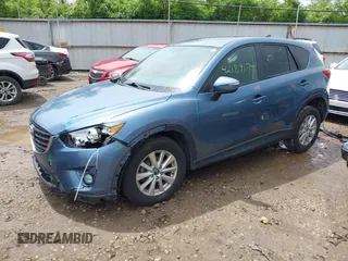 2016 Mazda CX-5 Touring z VIN JM3KE2CY3G0728968, wystawiony jako IAAI lot #42189174 z przebiegiem 145 977 mil mil oraz . Historia ofert i sprzedaży dostępna na DreamBid. Obrazek 18.