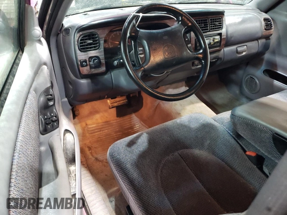 1997 Dodge Dakota z VIN 1B7FL26X3VS252323, wystawiony jako Copart lot #51695565 z przebiegiem 170 172 mil mil oraz Szkoda całkowita • Salvage title. Historia ofert i sprzedaży dostępna na DreamBid. Obrazek 8.