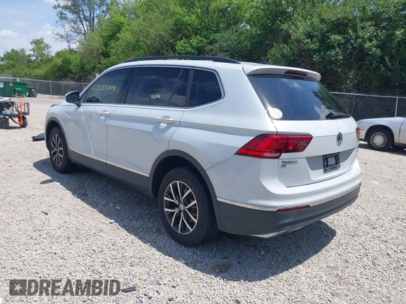 2018 Volkswagen Tiguan SEL z VIN 3VV2B7AX6JM195125, wystawiony jako IAAI lot #42523047 z przebiegiem 73 926 mil mil oraz . Historia ofert i sprzedaży dostępna na DreamBid. Obrazek 3.