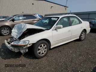 2002 Honda Accord EX z VIN 1HGCG56692A172799, wystawiony jako Copart lot #59371995 z przebiegiem 288 840 mil mil oraz Szkoda całkowita • Salvage title. Historia ofert i sprzedaży dostępna na DreamBid. Obrazek 1.