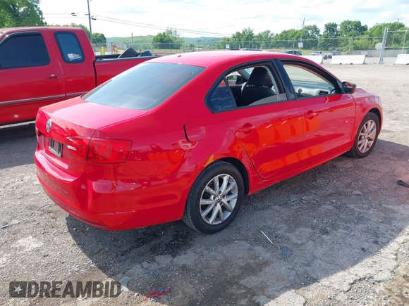 2014 Volkswagen Jetta S z VIN 3VW2K7AJ1EM434223, wystawiony jako IAAI lot #42245560 z przebiegiem 105 411 mil mil oraz . Historia ofert i sprzedaży dostępna na DreamBid. Obrazek 4.