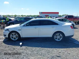 2013 Ford Taurus SEL with VIN 1FAHP2E80DG179961, listed as a IAAI auction lot 42088532 with 131,196 mi miles and . Bid and sale history available at carsss.com. Image 15.