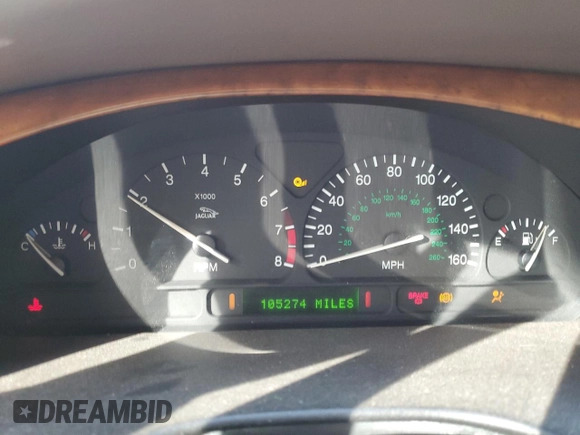 2000 Jaguar S-Type V8 with VIN SAJDA01D6YGL58384, listed as a Copart auction lot 46872315 with 105,274 mi miles and Salvage Title. Bid and sale history available at DreamBid. Image 9.