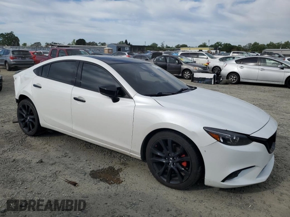 2017 Mazda 6 Grand Touring with VIN JM1GL1W51H1130289, listed as a Copart auction lot 52769205 with 82,155 mi miles and Salvage Title. Bid and sale history available at carsss.com. Image 4.