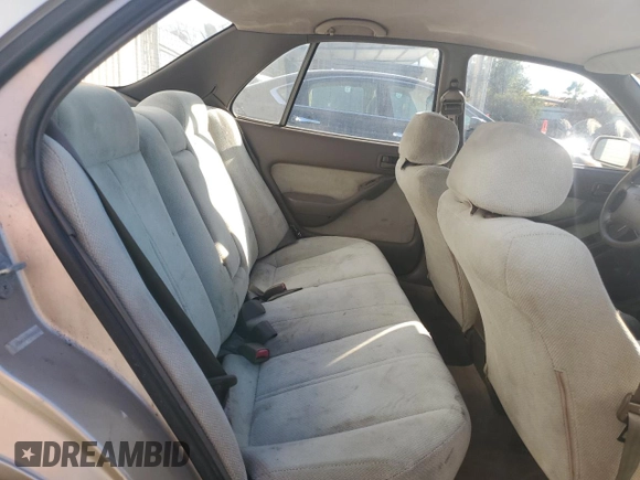 1994 Toyota Camry LE z VIN JT2GK12EXR0070117, wystawiony jako Copart lot #75997244 z przebiegiem 185 759 mil mil oraz Czysty tytuł • Clean title. Historia ofert i sprzedaży dostępna na DreamBid. Obrazek 10.