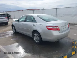 2009 Toyota Camry LE with VIN 4T1BK46K39U581157, listed as a IAAI auction lot 41827143 with 107,664 mi miles. Bid and sale history available at carsss.com. Image 3.