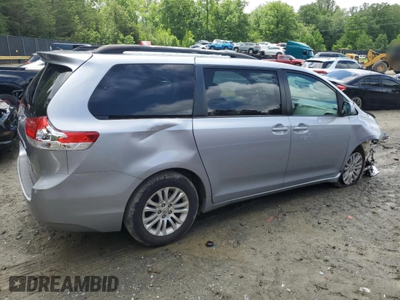 2011 Toyota Sienna XLE AAS z VIN 5TDYK3DC1BS165154, wystawiony jako Copart lot #57044235 z przebiegiem 232 461 mil mil oraz Szkoda całkowita • Salvage title. Historia ofert i sprzedaży dostępna na DreamBid. Obrazek 3.