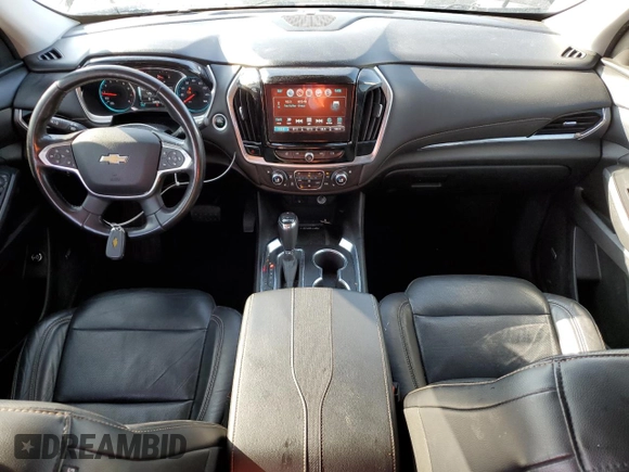 2018 Chevrolet Traverse Premier with VIN 1GNEVJKW5JJ152423, listed as a Copart auction lot 51202685 with 124,673 mi miles and Salvage Title. Bid and sale history available at DreamBid. Image 8.