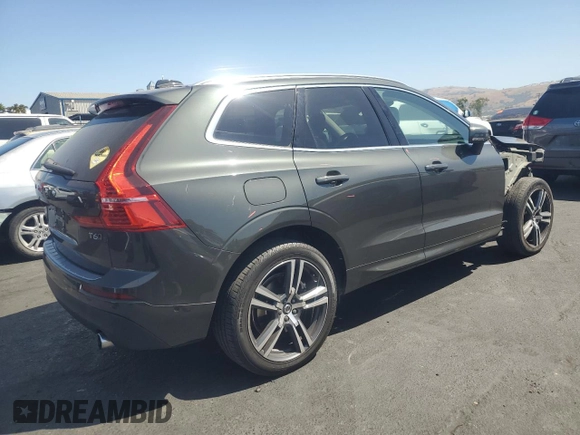 2018 Volvo XC60 Momentum with VIN LYVA22RK3JB117199, listed as a Copart auction lot 60888465 with 56,999 mi miles and Salvage title. Bid and sale history available at DreamBid. Image 3.