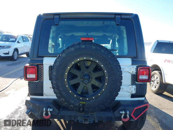 2021 Jeep Wrangler Sport S with VIN 1C4GJXAN2MW663880, listed as a IAAI auction lot 41059915 with 83,867 mi miles and . Bid and sale history available at DreamBid. Image 16.