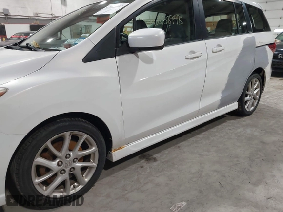 2012 Mazda 5 Grand Touring with VIN JM1CW2DL9C0100114, listed as a IAAI auction lot 42038998 with 160,651 mi miles and . Bid and sale history available at DreamBid. Image 12.