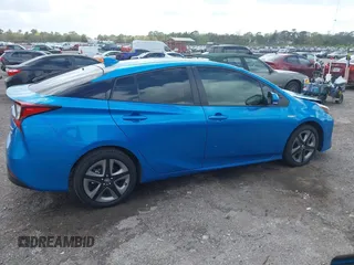 2022 Toyota Prius L Eco with VIN JTDKAMFU5N3165006, listed as a IAAI auction lot 41753470 with 33,567 mi miles and . Bid and sale history available at DreamBid. Image 13.