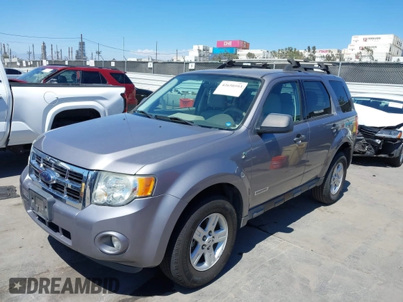 2008 Ford Escape Hybrid z VIN 1FMCU49H88KB89767, wystawiony jako IAAI lot #42650593 z przebiegiem 127 093 mil mil oraz . Historia ofert i sprzedaży dostępna na DreamBid. Obrazek 2.