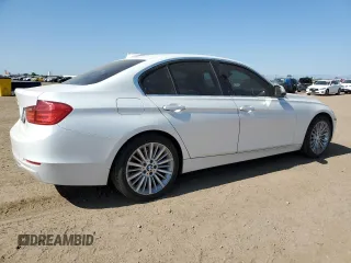 2013 BMW 3 Series 328i xDrive with VIN WBA3B3C51DF532714, listed as a Copart auction lot 57854735 with 140,650 mi miles and Salvage title. Bid and sale history available at DreamBid. Image 3.